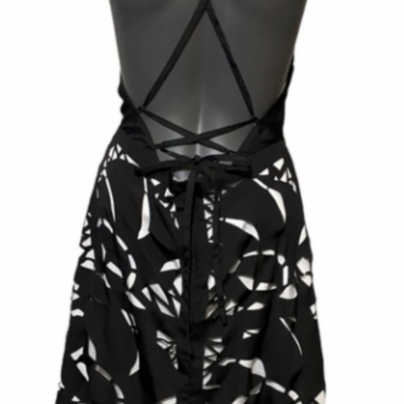 Laser Cut-Out Lace up Black and White Dress - Picture 2 of 6